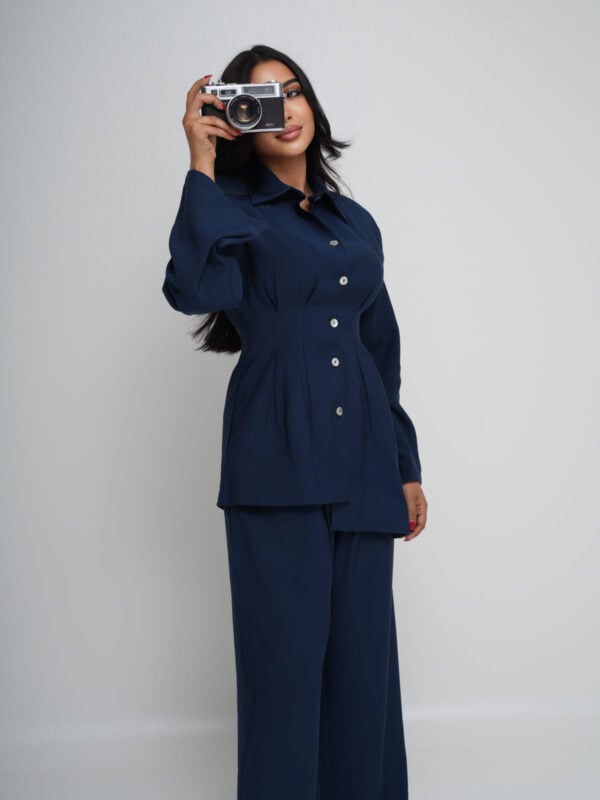 Navy Tencel shirt with an asymmetric hem, worn with matching wide-leg trousers