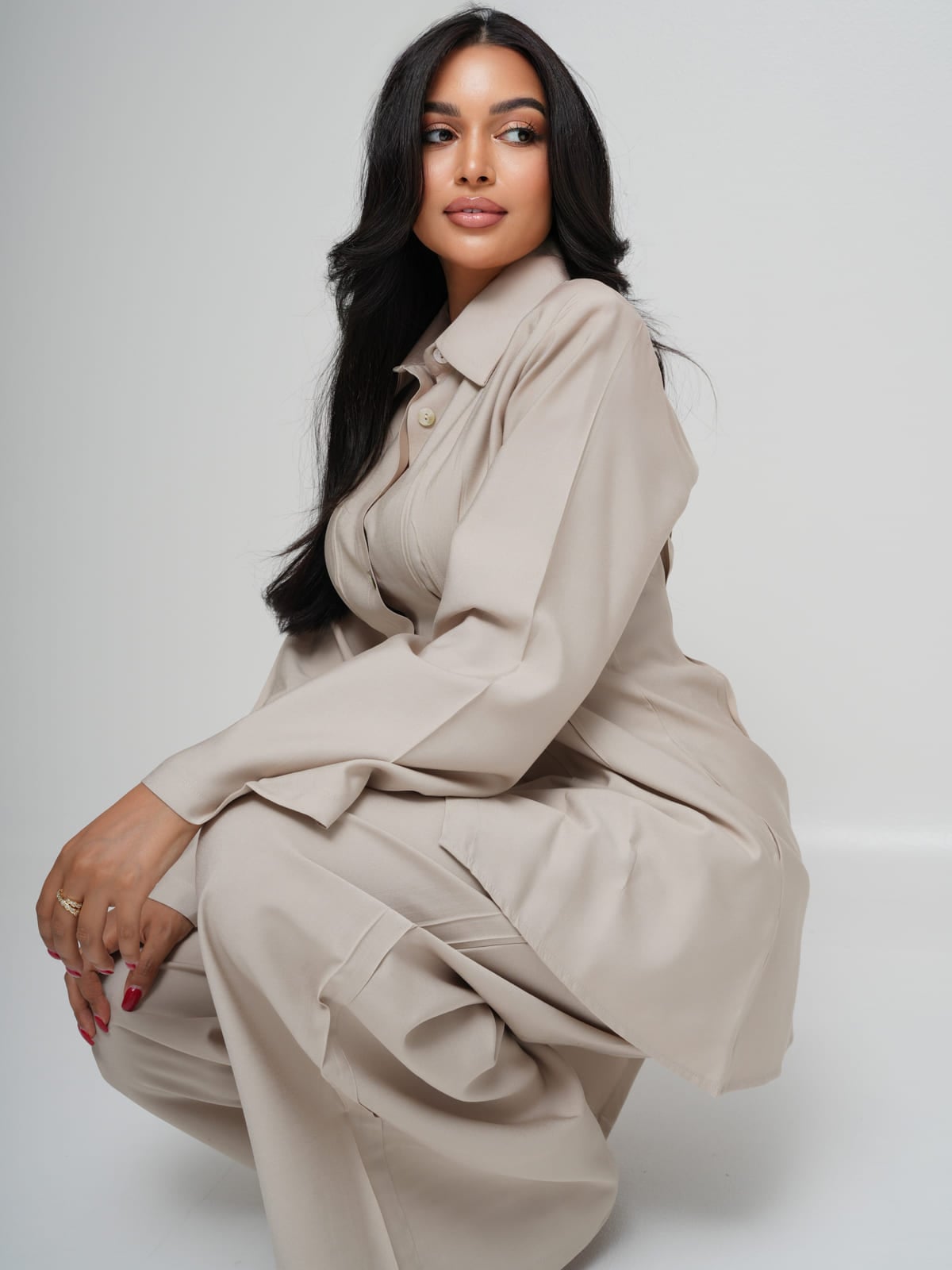 Cream Tencel shirt with structured shoulders and mother-of-pearl buttons, with matching wide-leg trousers