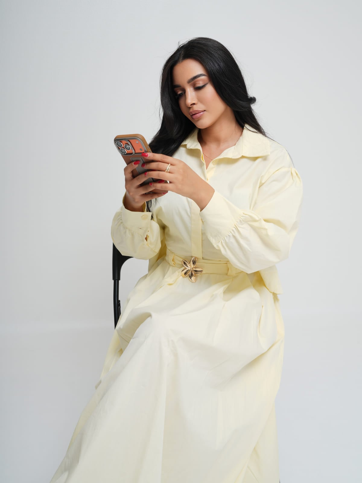 Soft yellow poplin shirt and matching skirt with a gold-hardware belt