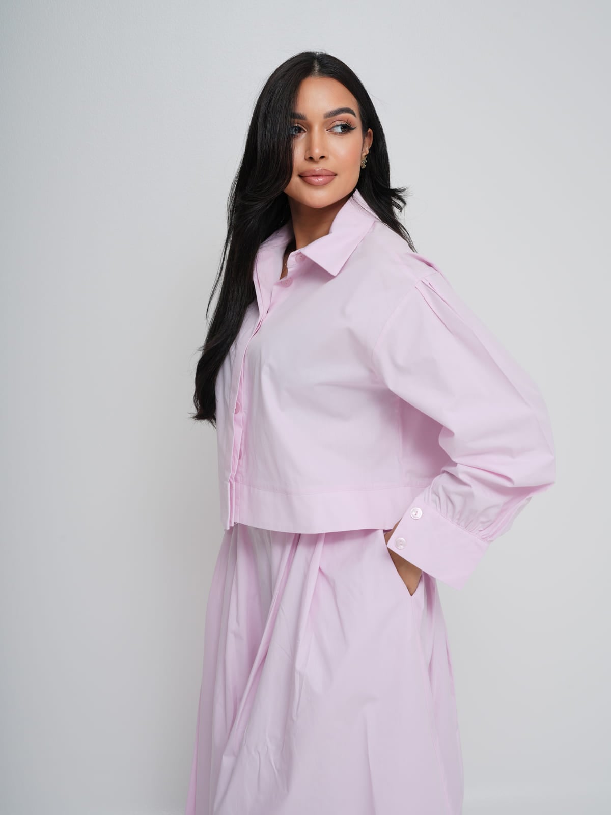 Pink poplin shirt and matching skirt with a gold-hardware belt
