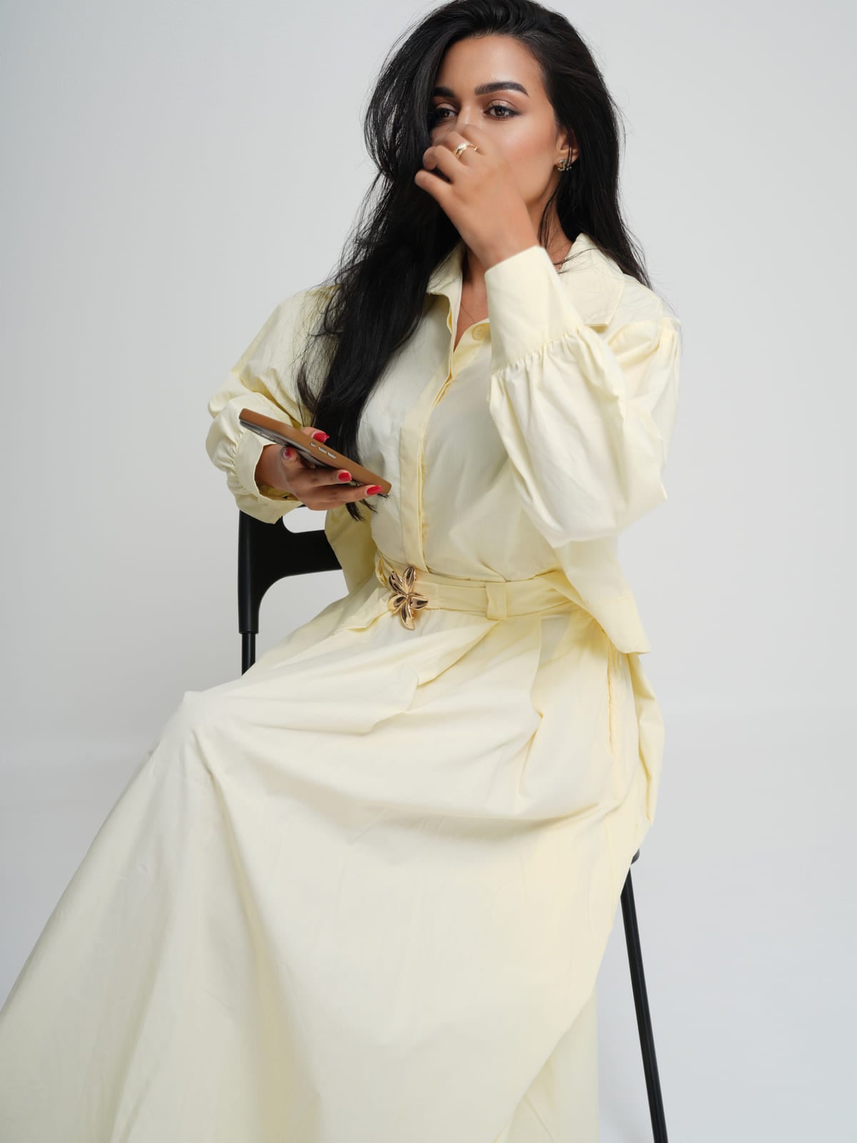Soft yellow poplin shirt and matching skirt with a gold-hardware belt